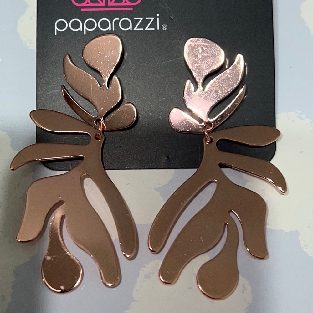 Copper post back leaf pattern earrings.